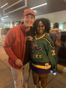 Kevin and a Random woman wearing a Mighty Ducks jersey in Minneapolis